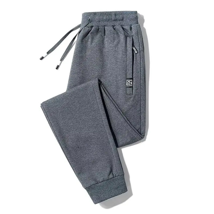 Men's elastic loose sports pants for spring and autumn, thin men's pants, leg binding pants, casual pants, sanitary pants