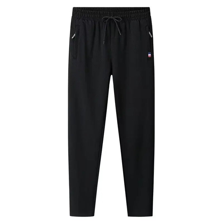 Men's elastic loose sports pants for spring and autumn, thin men's pants, leg binding pants, casual pants, sanitary pants