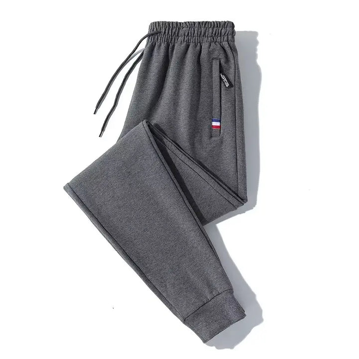 Men's elastic loose sports pants for spring and autumn, thin men's pants, leg binding pants, casual pants, sanitary pants