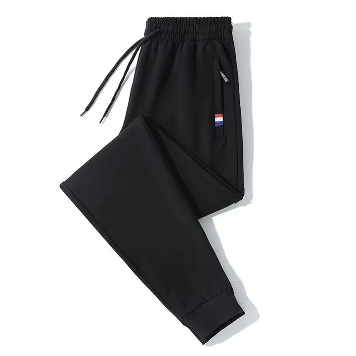 Men's elastic loose sports pants for spring and autumn, thin men's pants, leg binding pants, casual pants, sanitary pants